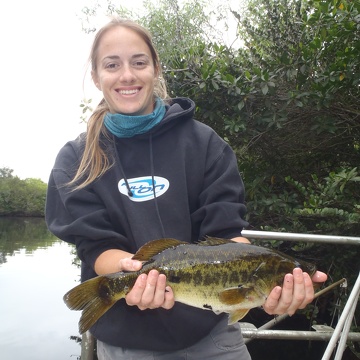Jessica Lee holding a largemouth bass (Micropterus salmoides) at Rookery Branch