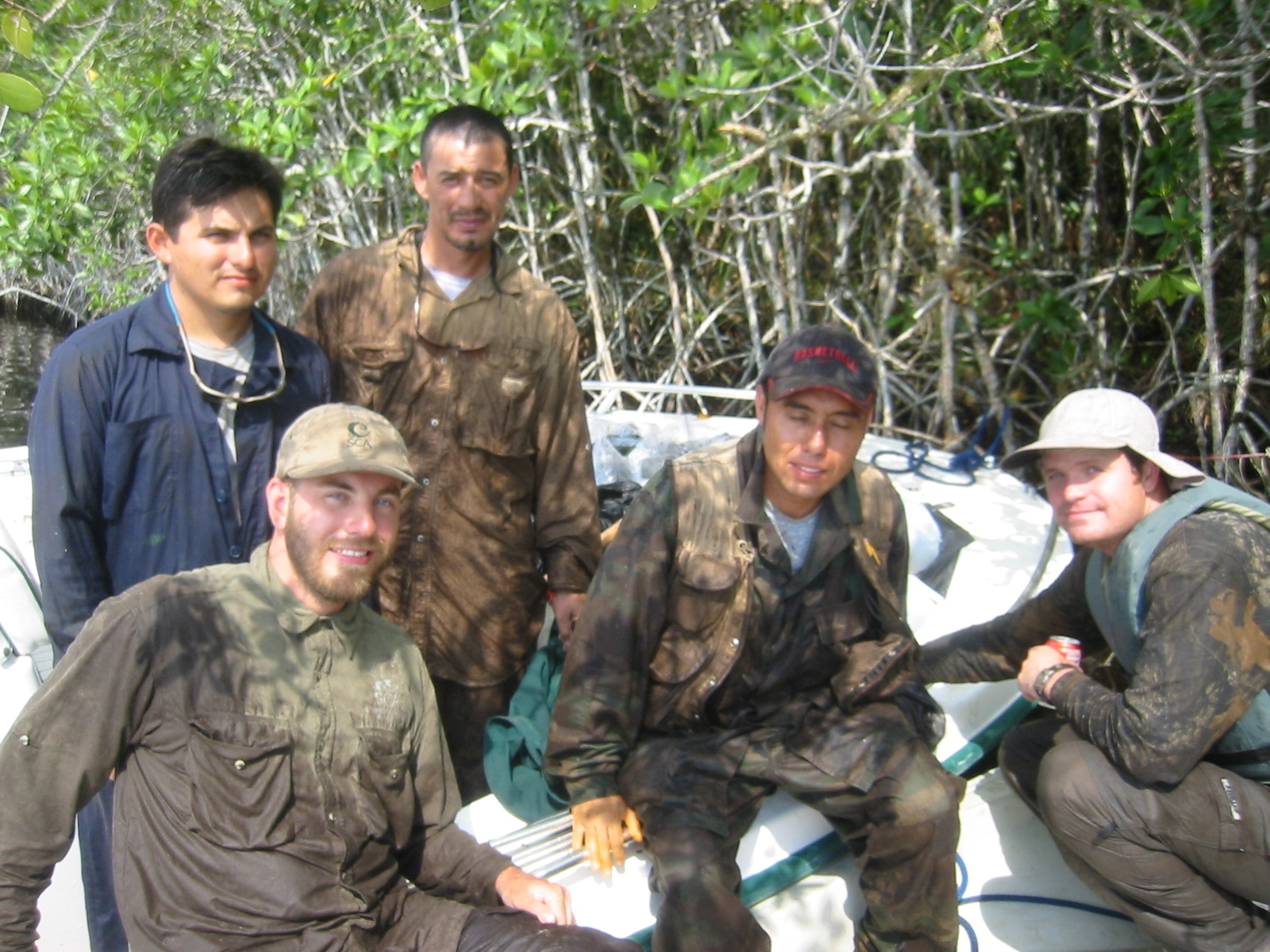 Left to right: Arturo Saldivar, Justin Baker, , Edward Castaneda, Dan Bond. Break after setting ingrowth root cores inside the mangrove forest at SRS-6 in Shark River Slough