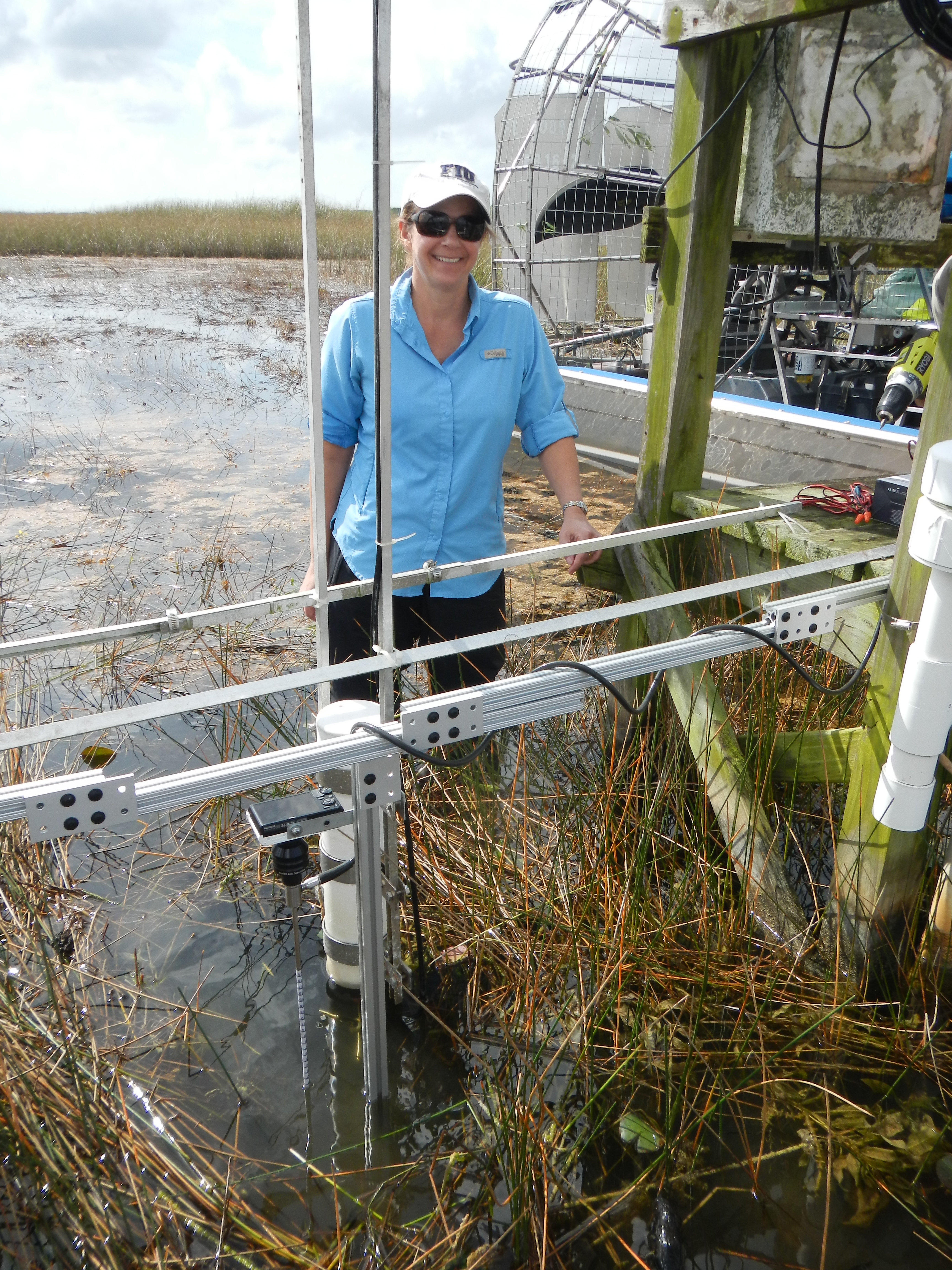 Dr. Price measuring surface water flow at SRS-1 in Shark River Slough