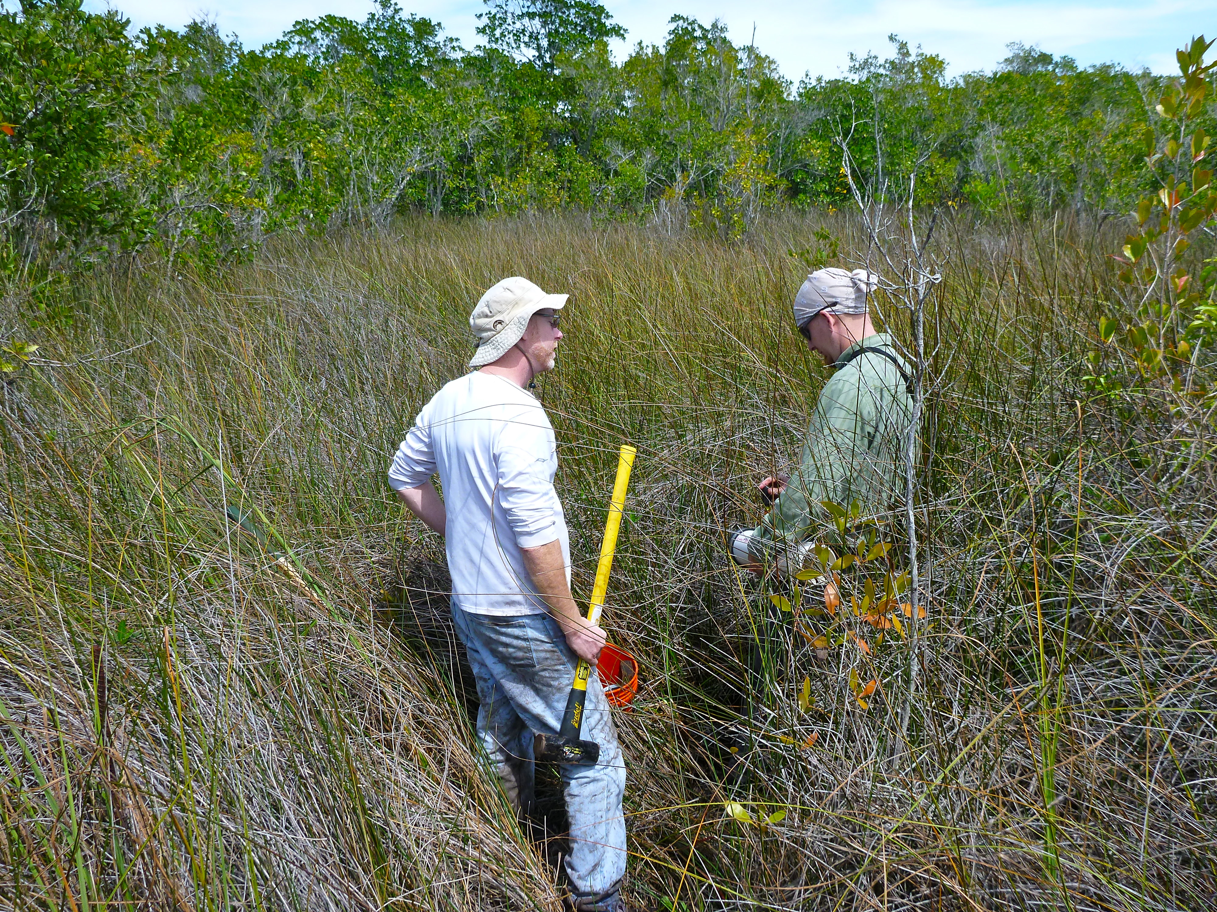 Donny Smoak and Josh Breithaupt collecting soil cores